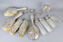 An Edwardian Twelve Piece Silver Dressing Table Set