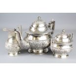 A Three Piece Indian Silver Tea Set