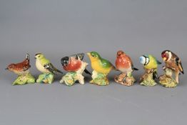 A Quantity of Porcelain Beswick Garden Birds