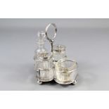 A Cut Glass and Silver Plated Cruet Set