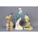 A Royal Worcester Budgie Figurine