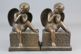 A Pair of Bronze Cherub Book Ends