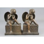 A Pair of Bronze Cherub Book Ends