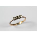 An Antique 18ct and Platinum Three Stone Old-Cut Diamond Ring