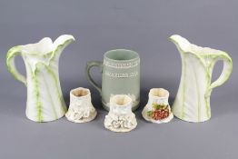 A Pair of Royal Worcester Leaf Jugs