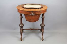 A Late Victorian Oval Walnut Sewing/Work Table