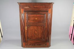 An Antique Oak Corner Cabinet