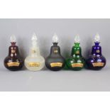 Four Inverted Teardrop Glass Apothecary Bottles
