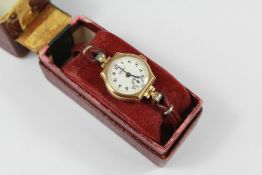 A Lady's Yellow Gold Cocktail Watch