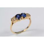 An 18ct Yellow Gold Sapphire and Diamond Ring