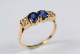 An 18ct Yellow Gold Sapphire and Diamond Ring