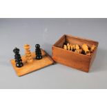 A Fruit Wood Box of Chess Pieces