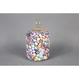 A Millefiori End of Day Glass Paper Weight