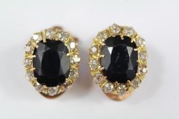 A Pair of Yellow Gold Sapphire and Diamond Clip on Earrings