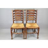 Four Ladder-back Dining Room Chairs
