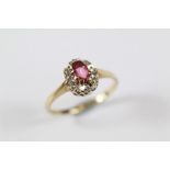 A 9ct Diamond and Ruby Ring