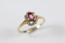 A 9ct Diamond and Ruby Ring