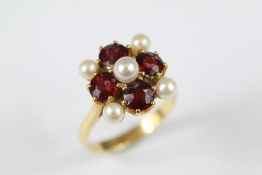 A 18ct Rhodalite and Pearl Ring