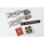 A Collection of Mini-Cooper 1300 Car Badges