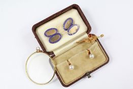 A Pair of Gentleman's 14 ct Mikimoto Pearl Dress Studs