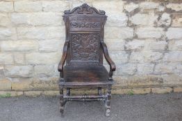 An Antique Oak Hall Chair