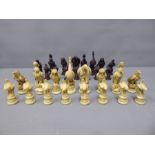 A Box Containing Resin Chess Pieces