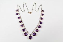 An Edwardian 14/15ct Gold Graduated Amethyst Necklace