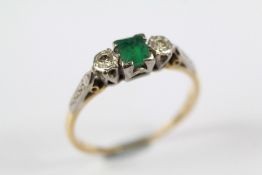 A Lady's 18ct Gold and Platinum Emerald and Diamond Ring