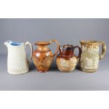 Four Antique Harvest Jugs