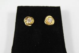 A Pair of 18ct Yellow Gold Diamond Stud Earrings