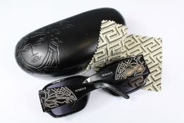 A Pair of Versace Sunglasses