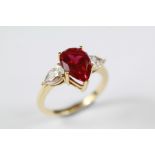 A 14ct Yellow Synthetic Ruby and CZ Ring