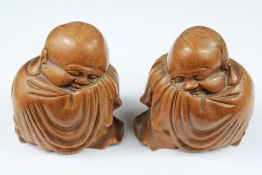 A Pair of Chinese Fruitwood Sleeping Buddha