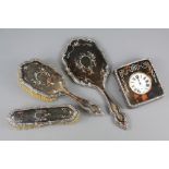 A Silver and Tortoiseshell Dressing Table Set