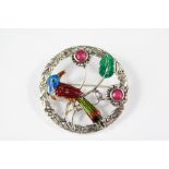 A Silver and Enamel Brooch