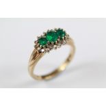 A 9ct Gold Diamond and Green Stone Ring