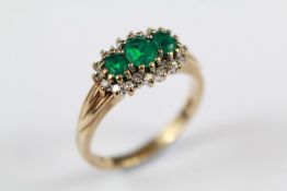 A 9ct Gold Diamond and Green Stone Ring