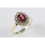 An 18ct Yellow Gold Ruby and Diamond Cluster Ring