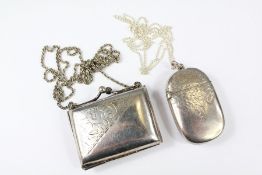 A Silver Vesta and Chain