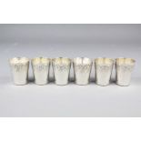 A Set of Six Silver Plated Shot Cups