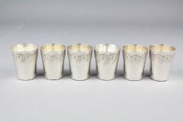 A Set of Six Silver Plated Shot Cups