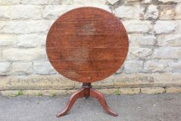 An Oak Tilt-top Supper Table