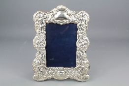 A Silver Rococo Style Easel Photo Frame