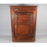 An Antique Oak Corner Cabinet