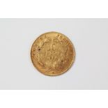 A Napoleon III Gold 10 Franc Coin dated 1864
