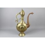 A 19th Century Islamic Bronze and Copper Ewer