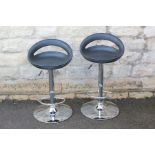 A Pair of Contemporary Chrome and Leather Bar Stools