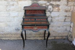 A Louis XV Style Ebonised and Burr Walnut Desk
