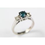 An 14ct Whte Gold Blue Diamond Ring