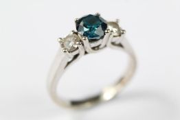 An 14ct Whte Gold Blue Diamond Ring